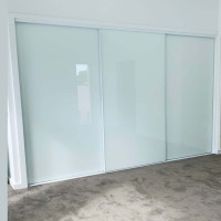 Frameless Sliding Wardrobe Doors Greenish White Glass Finish