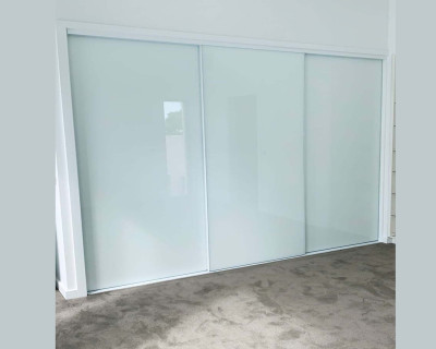 Frameless Sliding Wardrobe Doors Greenish White Glass Finish